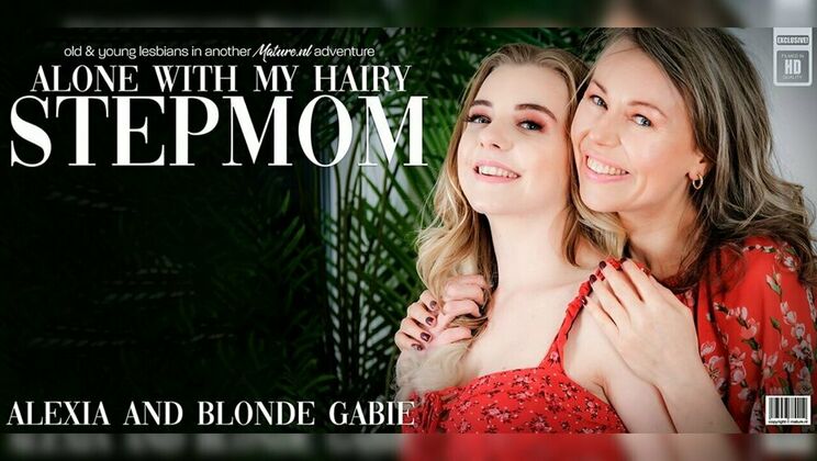 [Mature.nl] - Gabie the Blonde Teen Seduces Stepmom Alexia on the Couch